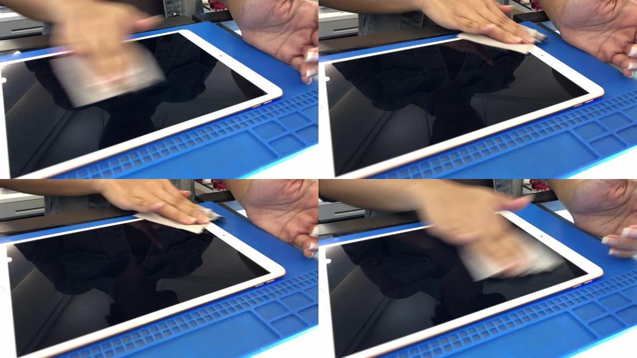 数字平板电脑的女性手屏保护膜