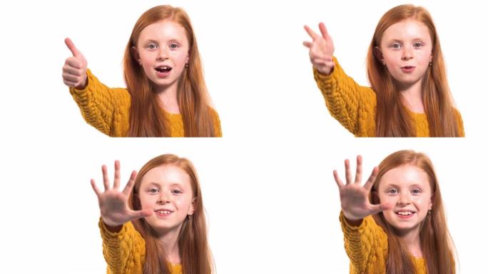 微笑的女孩用手指显示倒计时。从一数到五的小女孩。手上的倒计时