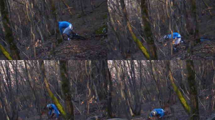 男性山地自行车手在岩石小径上被讨厌地消灭了