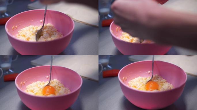 奶酪，鸡蛋在塑料碗中混合