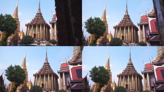 仰望泰国寺庙建筑。泰国曼谷翡翠佛寺Phra Kaew。平移镜头
