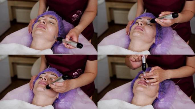 美容师在患者脸上进行水力剥离和清洁程序。面部皮肤保湿、去角质和年轻化。