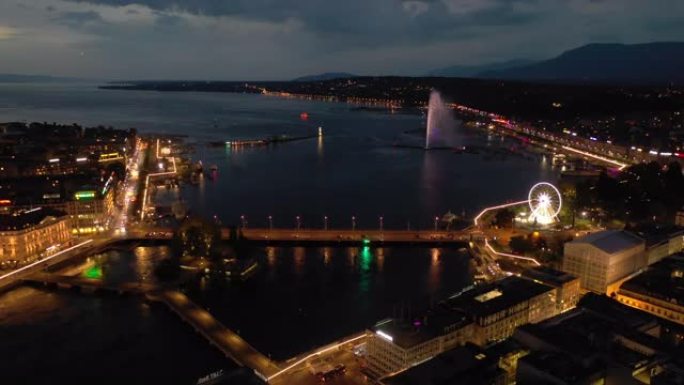 日落之夜照明飞行在日内瓦市中心湖滨交通河湾空中全景4k瑞士