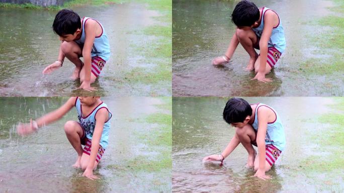 小学时代可爱的小孩在雨季玩泥水