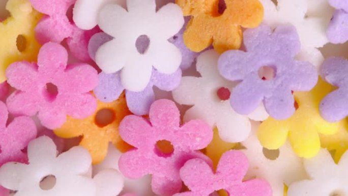 花形糖糖果洒在柔和的颜色