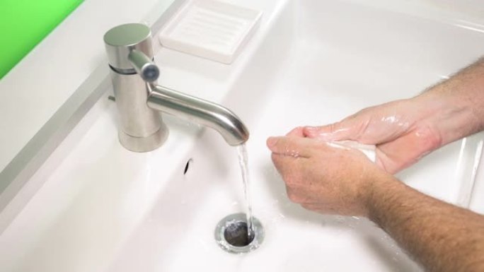 男子洗手以防止病毒感染和清洁脏手