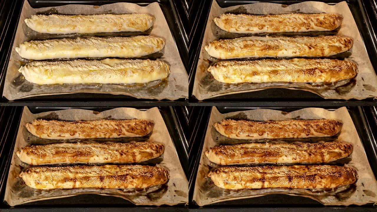 在家用烤箱中用奶酪烹饪法式长棍面包，时间流逝