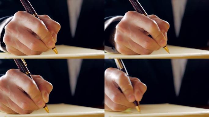 商人用笔在法律笔记本上手写的特写镜头