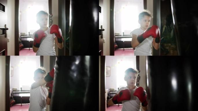 小男孩用出气筒训练拳击