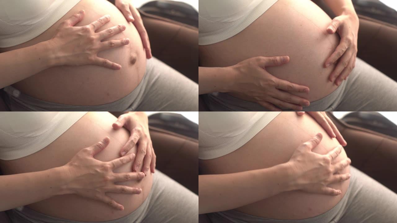 孕妇摸着肚子孕妇摸着肚子