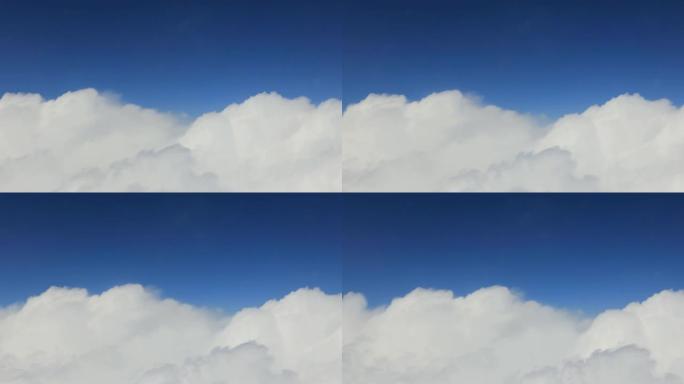 飞机在云和蓝天中飞行