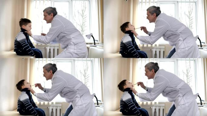 儿童医生在医院检查小男孩