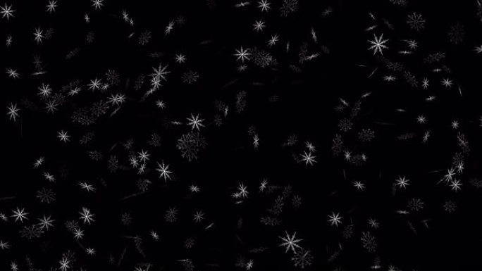 黑色背景上飘落的冬季雪花的抽象图案