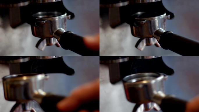 将咖啡豆研磨并包装到浓缩咖啡机中的特写镜头