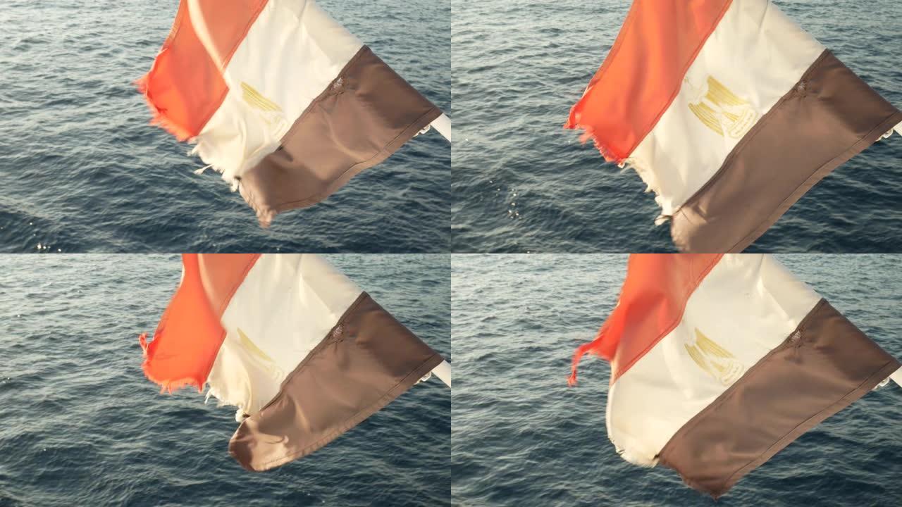 来自蓝色大海中的游艇的埃及国旗