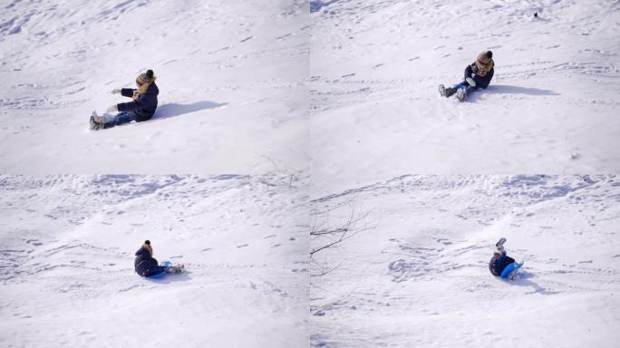 冬天的小男孩雪橇。