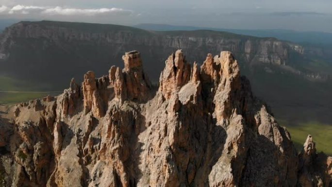 Aerial view of a drone flying over sharp rocky out