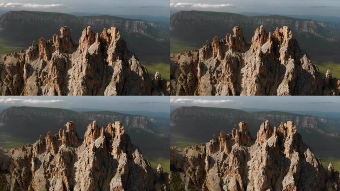 Aerial view of a drone flying over sharp rocky out