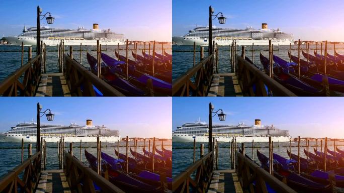 吊船停泊，圣马可，威尼斯，意大利。贡多拉斯船在日落时停车。意大利吊船停靠在圣马可，日落在威尼斯，威尼