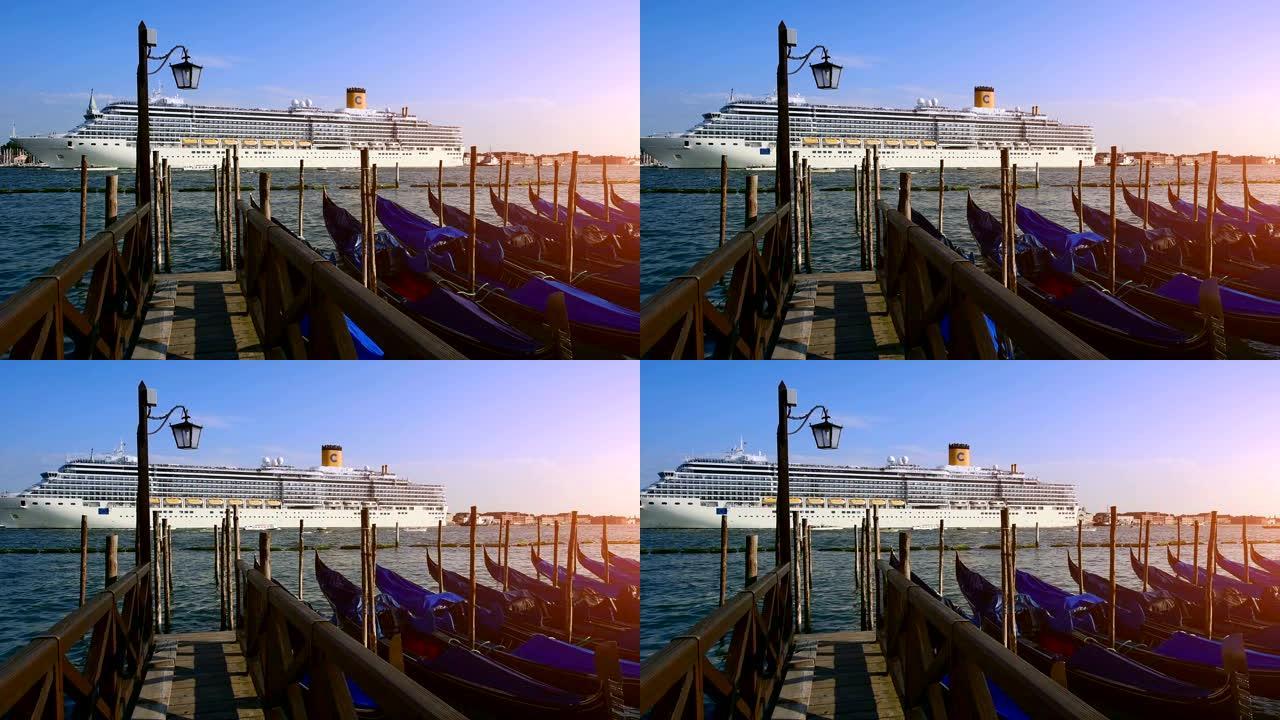 吊船停泊，圣马可，威尼斯，意大利。贡多拉斯船在日落时停车。意大利吊船停靠在圣马可，日落在威尼斯，威尼