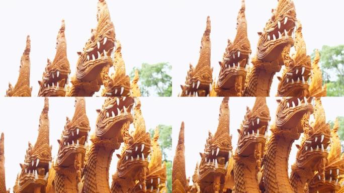 泰国传统节日佛日游行中的蛇王蜡烛