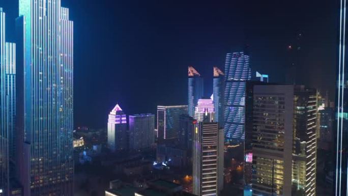 青岛市著名的市中心夜间照明表演空中全景4k中国