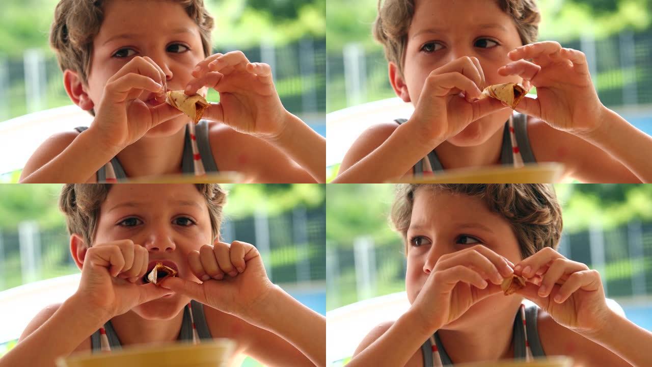 小男孩吃卷煎饼吃食物小孩