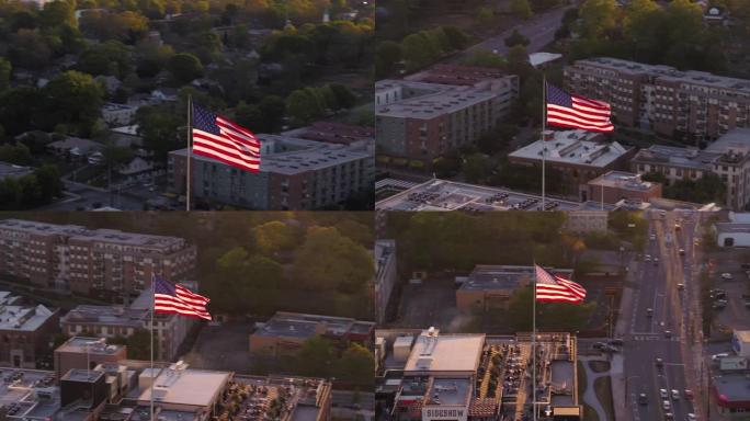 亚特兰大航空v267在日落时在PCM大楼上的美国国旗周围低空飞行