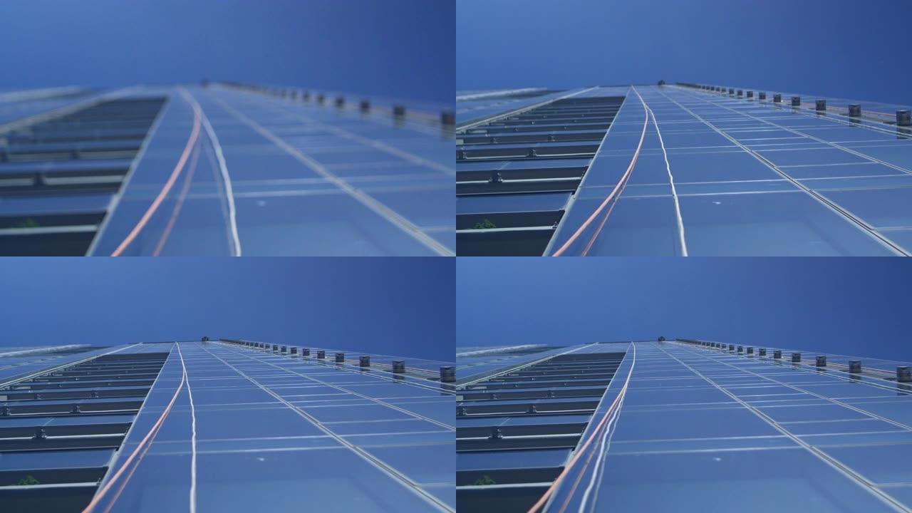 玻璃摩天大楼上悬挂的窗户清洗器的安全绳的极限角度