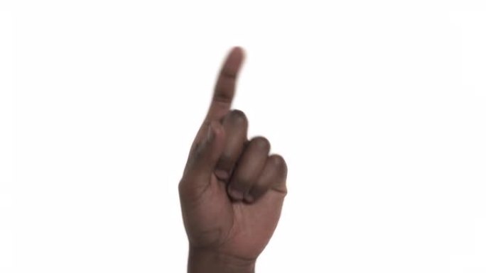 一个人用食指指着虚拟物体的特写镜头。手势和肢体语言概念