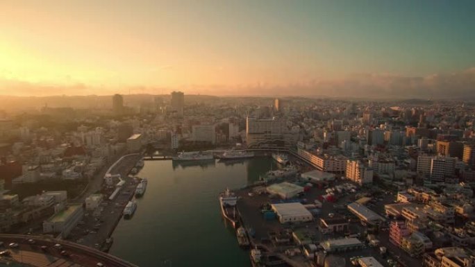 日本那霸市冲绳日出时鸟瞰图，海景和托马里港