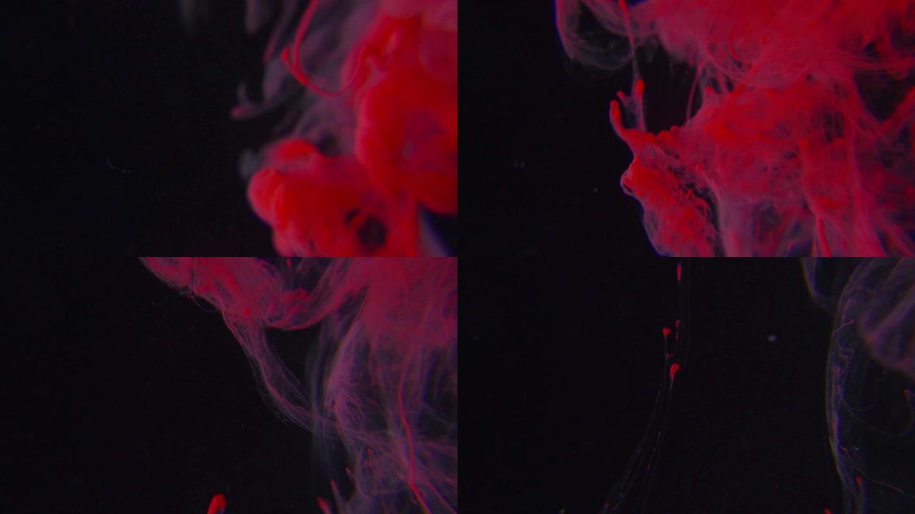 红色染料喷涂看起来像水中的血液，作为慢动作的程式化抽象背景视频