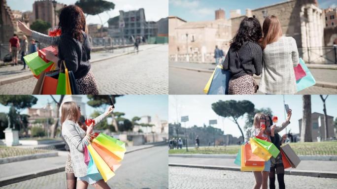 迷人的时尚女孩与彩色纸购物袋在市中心自拍照片。两名模特在街上喝aperetif鸡尾酒，配杯橙色饮料，