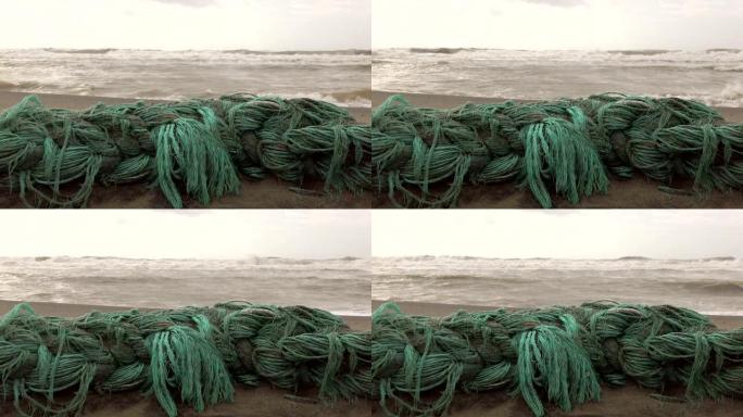 海洋中的塑料废物，大自然用从海中喷出的塑料网的残骸回馈人类的伤害-慢动作射击