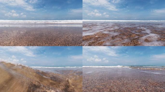 海水波浪在海滩上的摄像机上泛滥成灾
