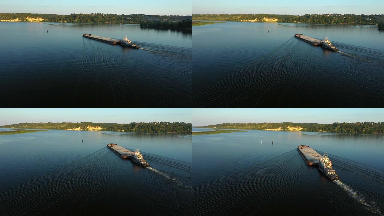 在中欧夏季河中部，航空视频河推船用干货运输驳船