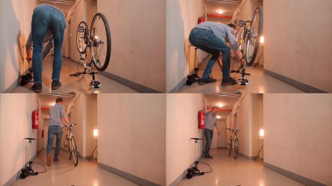 一名男子在车库里翻转自行车，修理后戴上车轮。