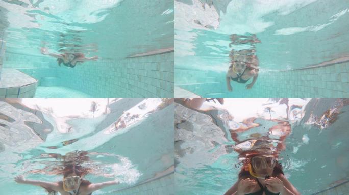 水下女人放松浮潜自拍在游泳池暑假玩得开心
