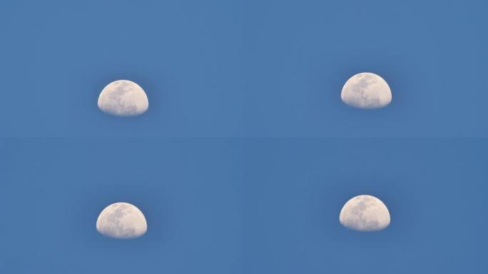 特写背景傍晚月亮升起蓝天。加速视频