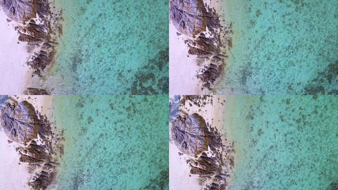 空中无人机拍摄美丽的天堂海滩，碧绿的大海。