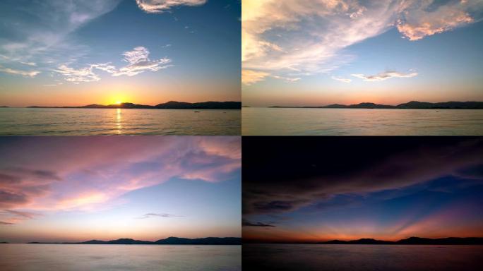 4k延时镜头日落或日出美丽的自然光风景天空和云与海洋中的反射和云在天空中流动