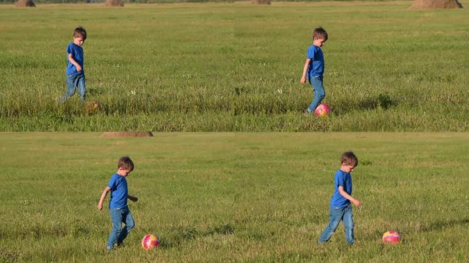 户外带球的小男孩户外带球的小男孩