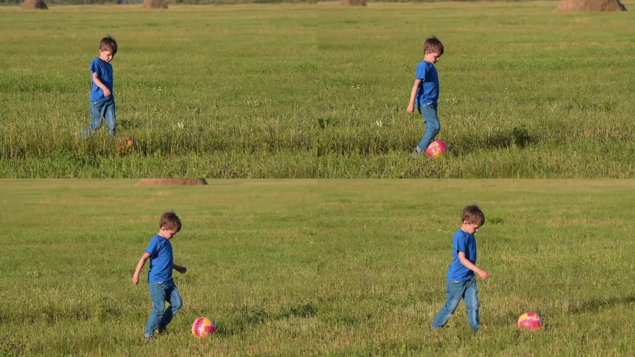 户外带球的小男孩户外带球的小男孩