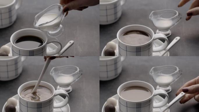 将奶油倒入黑咖啡中，然后用勺子混合。