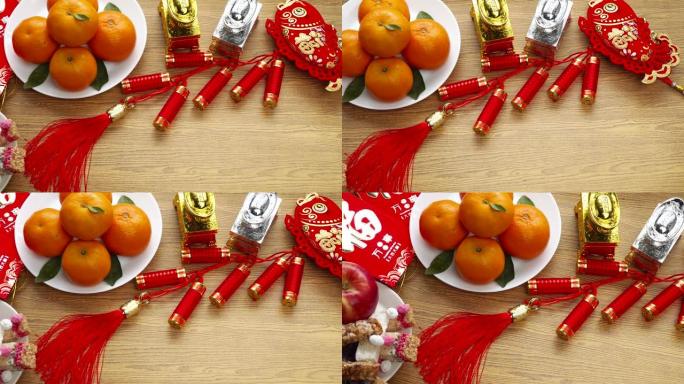 平铺农历新年节日装饰品配橙苹果葡萄和re