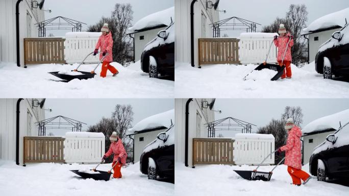 冬季暴风雪后，童女帮助用铁锹清理积雪。