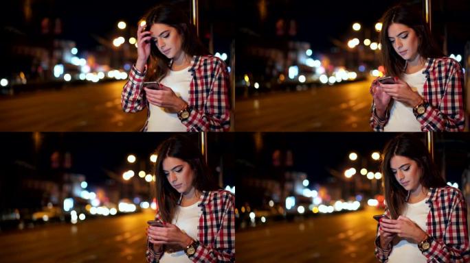 女人在街上使用手机