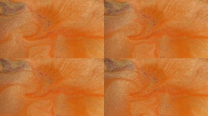 橙色珊瑚漆。液体闪光纹理。摘要背景