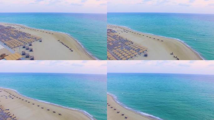 希腊金色沙滩和碧蓝大海上的撒哈拉度假海滩酒吧