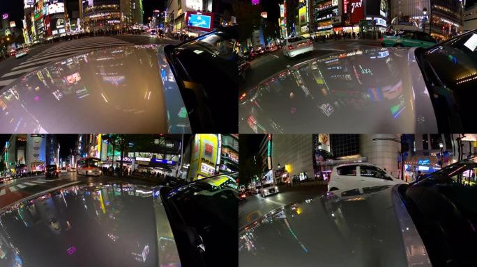 开车穿过东京的涩谷十字路口